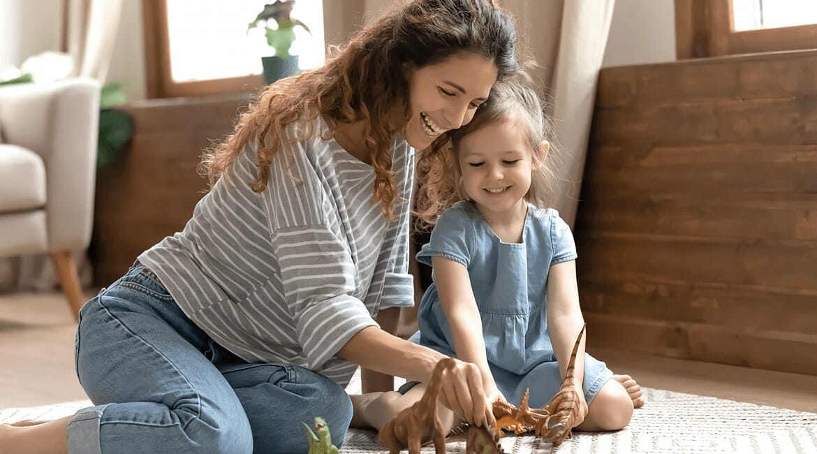 Mother is reading the book with her kids